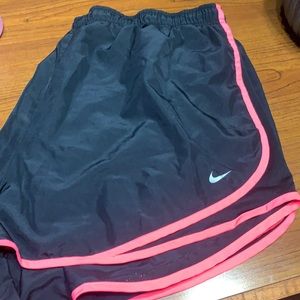 Plus size Nike shorts 3x black with bright pink on the sides.